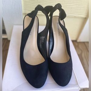 Black sling back pumps